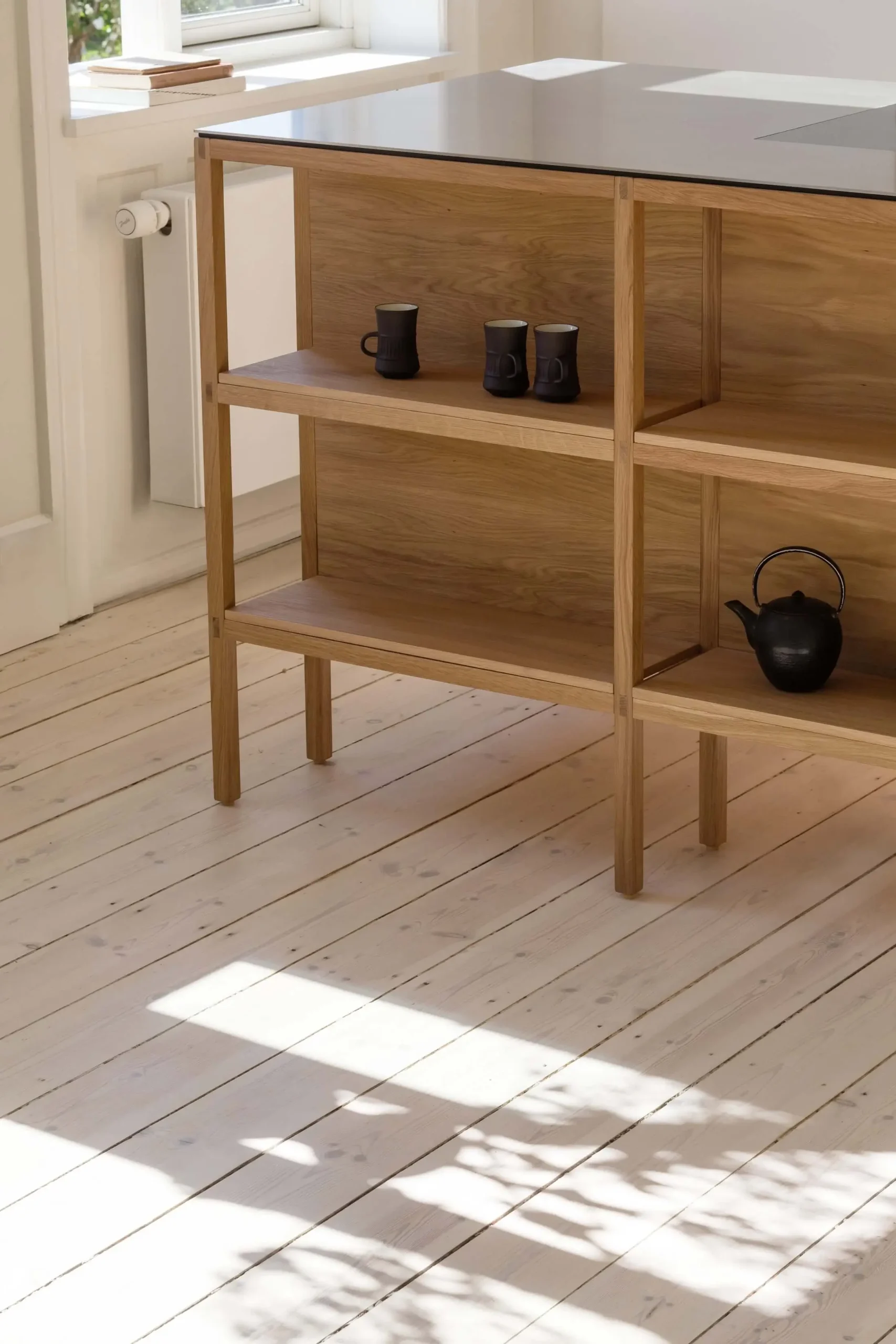 Japandi kitchen by Kongacph, featuring a 25x25 minimalist design with natural wood elements, clean lines, and a serene, modern aesthetic.