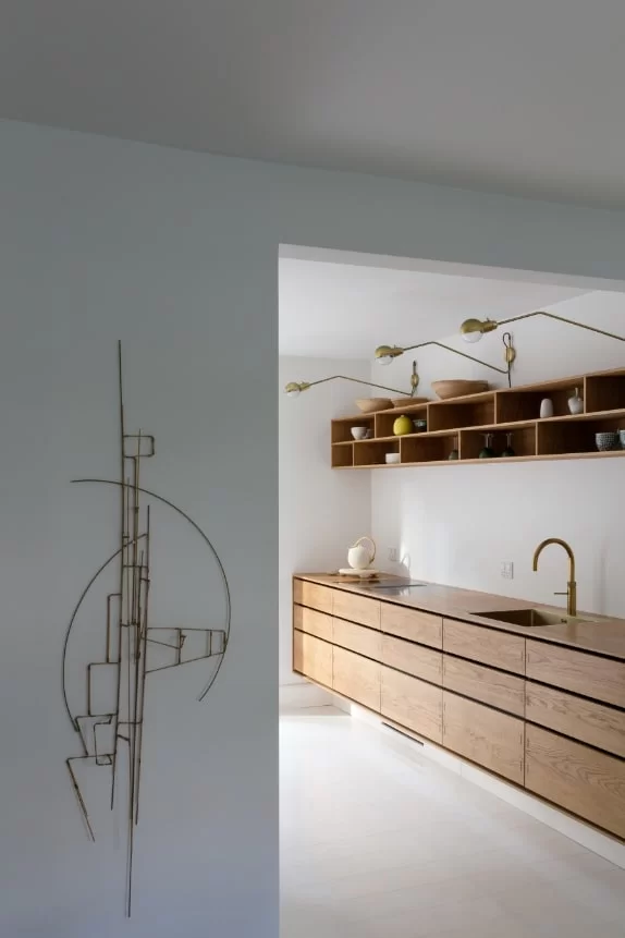 Scandinavian minimalist kitchen with natural wood cabinets and exposed tenon joinery by kongacph