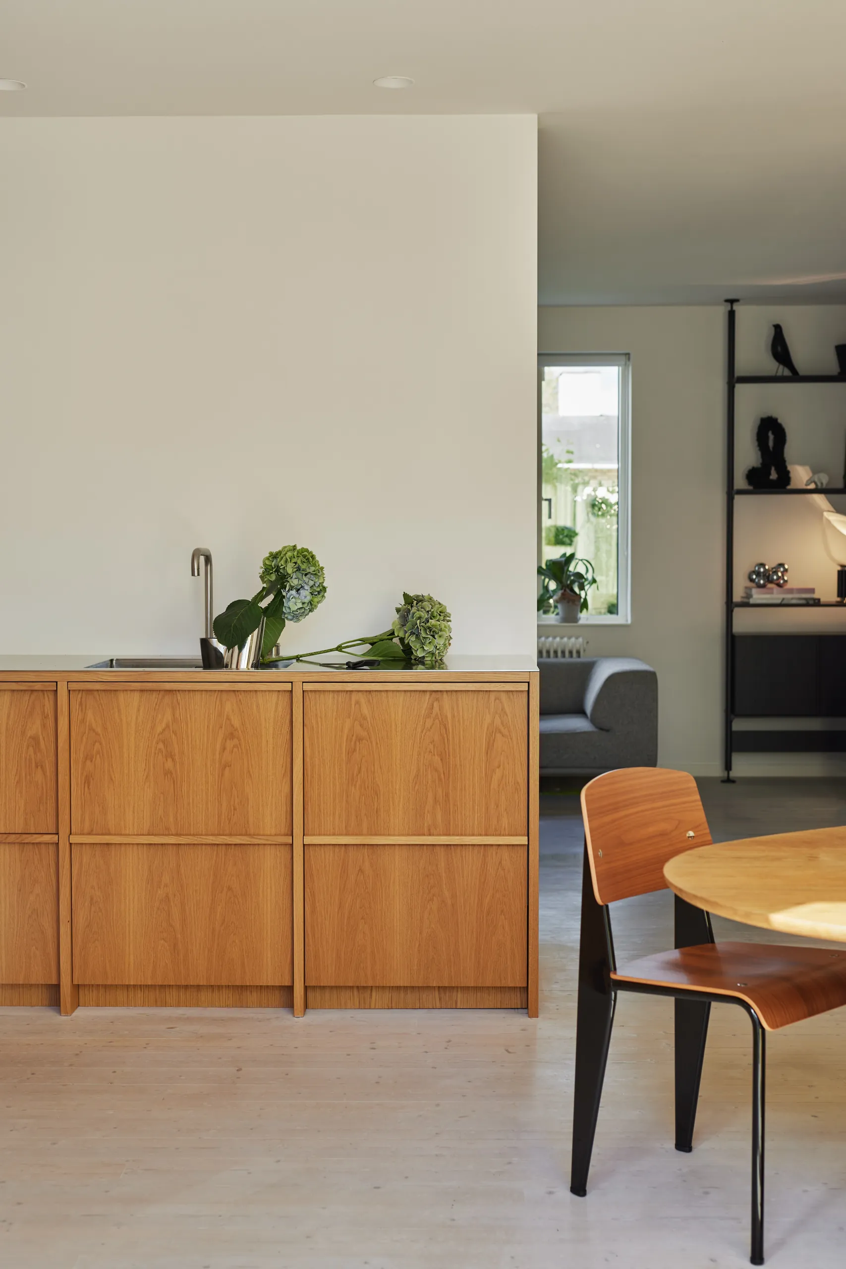 A Calm L-Shaped Oak Kitchen in Anne Boysen’s Home 25 low kitchen cabinetry kongacph